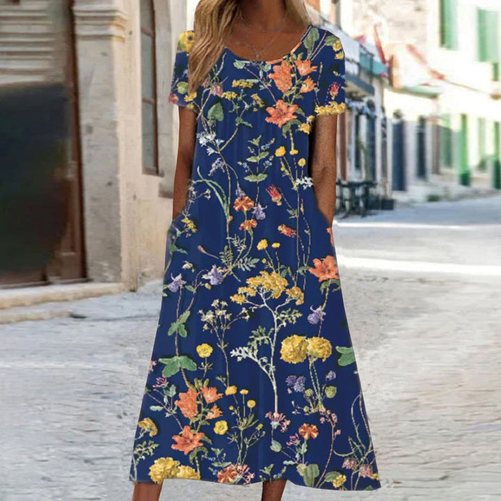 Robe d'été florale femme, motif coloré et frais. Look élégant et décontracté, parfait pour le printemps, l'été et les vacances.