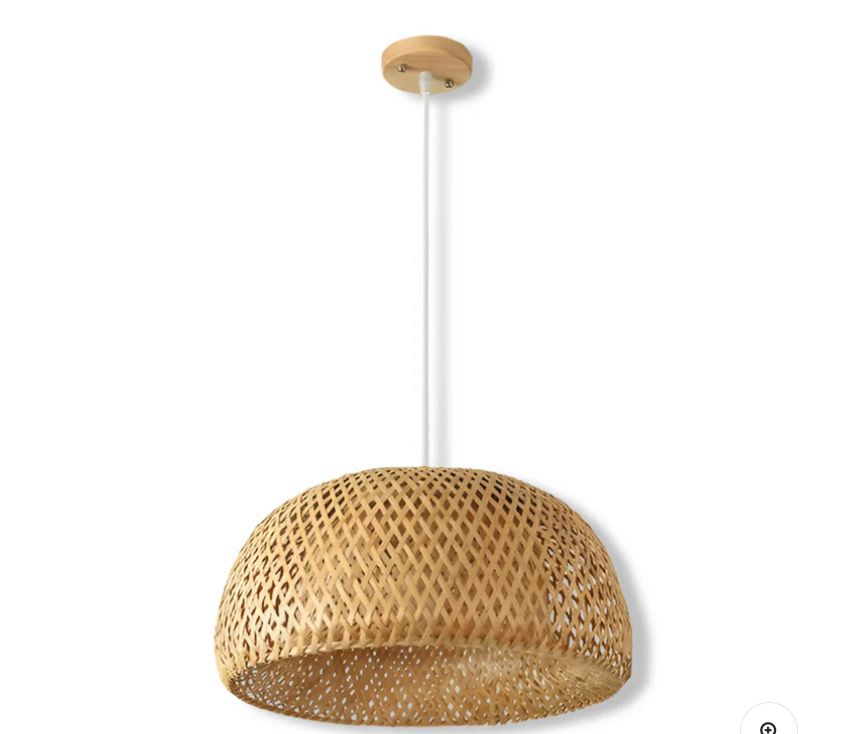 Luminaire bohème design, apporte une lumière douce et une touche exotique à votre salon.
