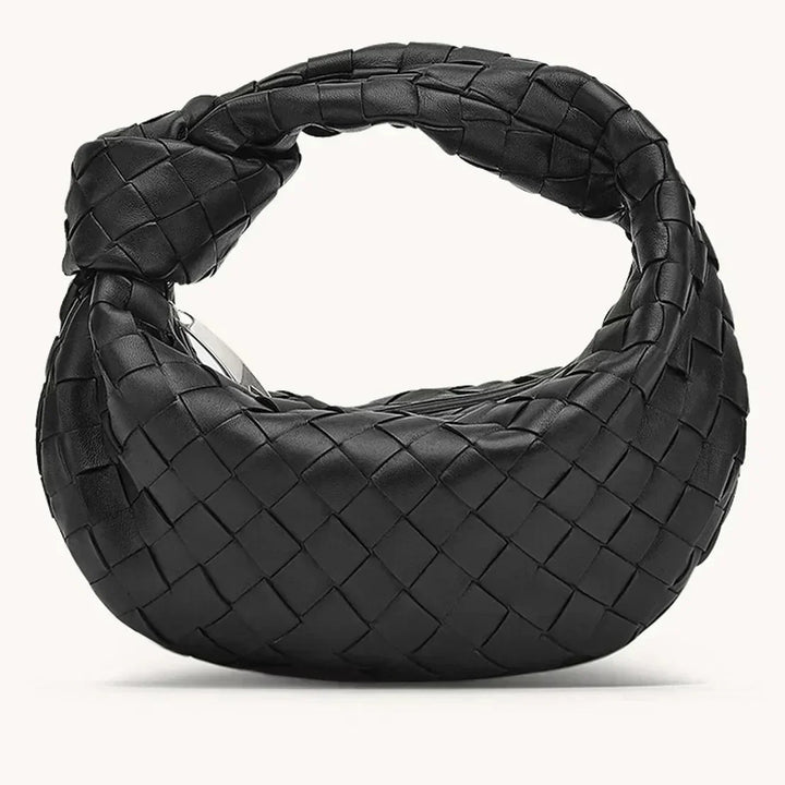 Sac quotidien femme en cuir de haute qualité, style intemporel. Très fonctionnel avec bandoulière.