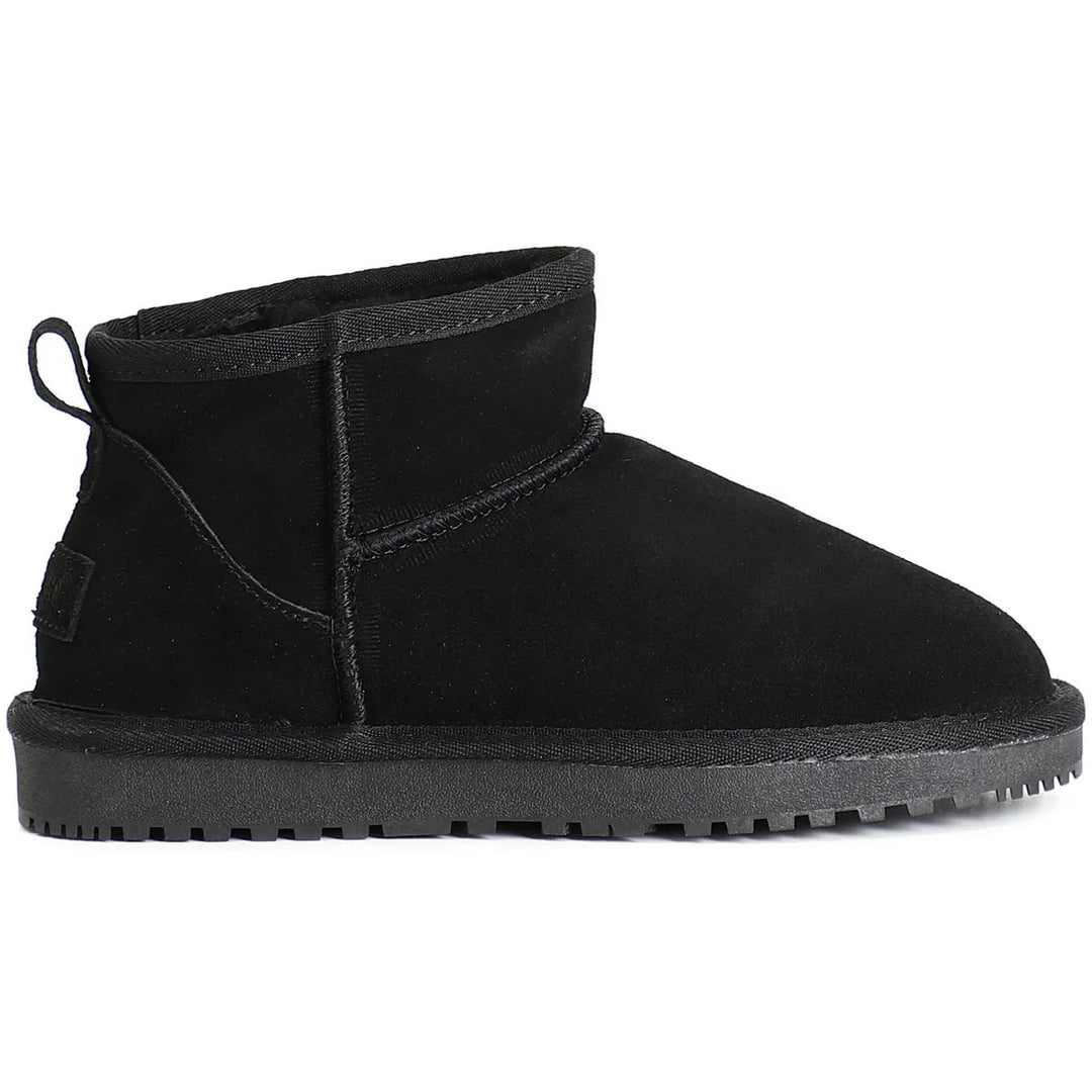 Semelle antidérapante des bottines d'hiver femme en suédine, pour une adhérence parfaite sur neige et glace.
