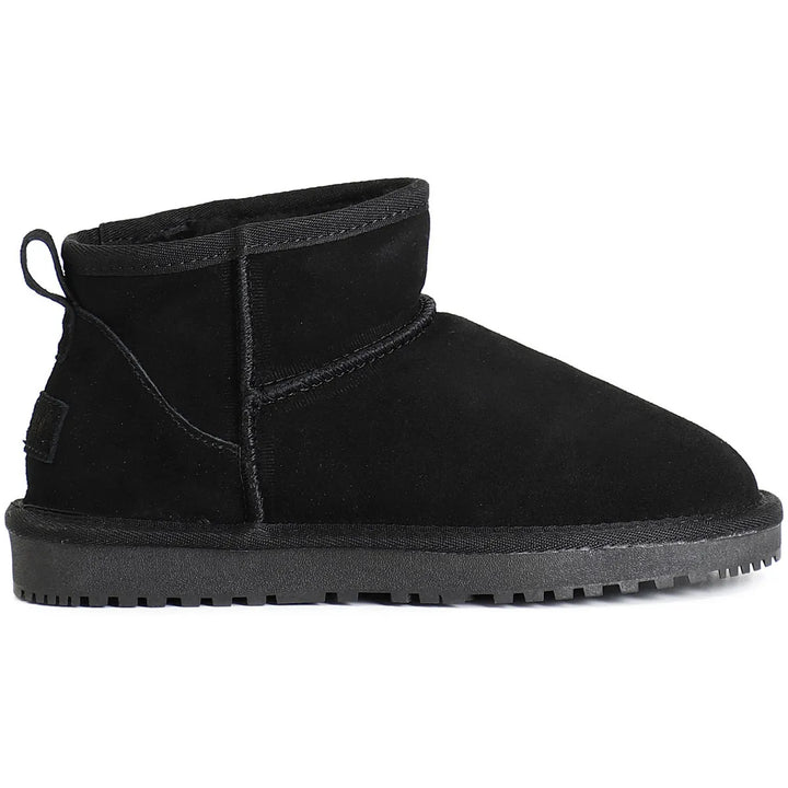 Semelle antidérapante des bottines d'hiver femme en suédine, pour une adhérence parfaite sur neige et glace.