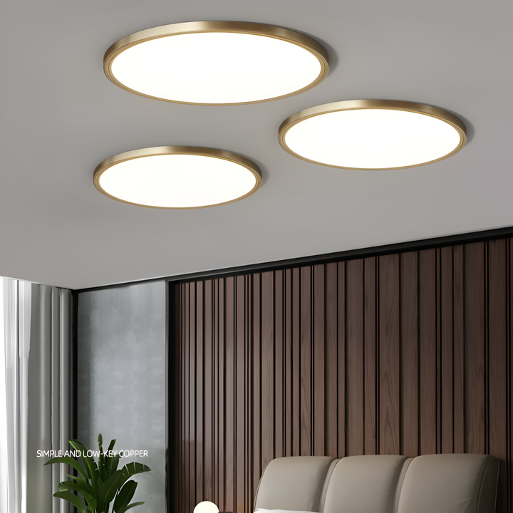 Plafonnier LED rond ultrafin bronze, design moderne pour éclairage intérieur élégant.