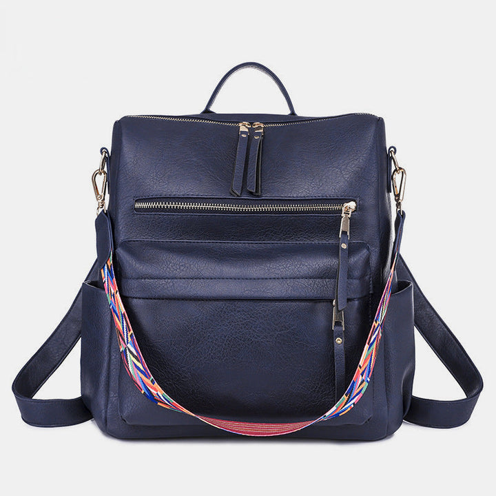 Sac à dos femme imprimé serpent, vert et marron, pour un look chic et sauvage au quotidien.