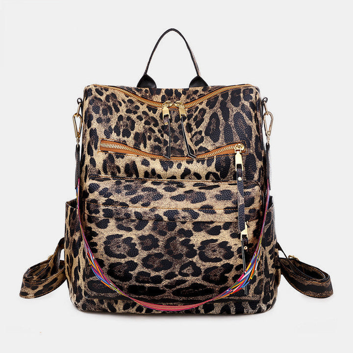 Sac à dos mode femme, imprimé serpent vert, pratique pour le quotidien actif et stylé.