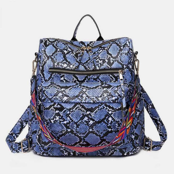 Sac à dos élégant femme, imprimé léopard, confortable pour les longues journées actives.