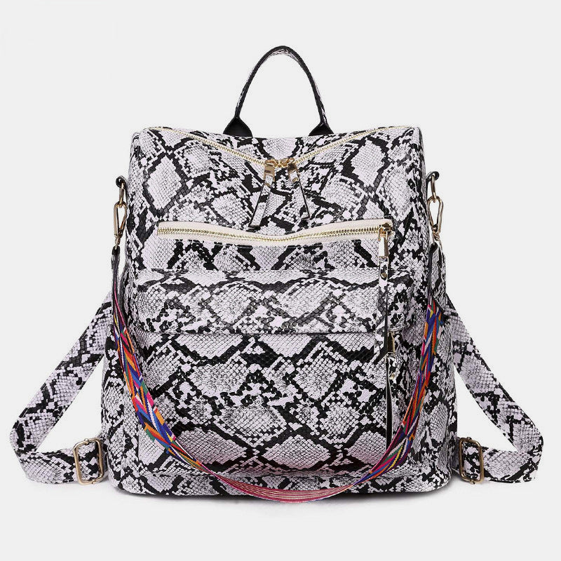 Sac à dos fonctionnel femme, avec touches de vert et marron, pour un style naturel et élégant.