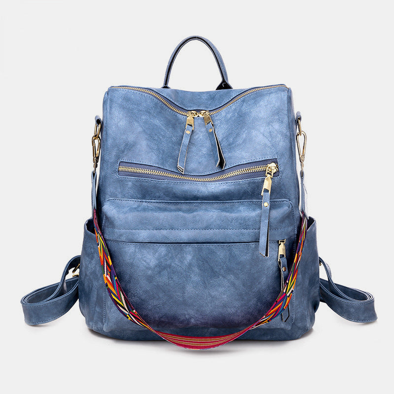 Sac à dos multicolore femme, avec motif vache, original et stylé pour la ville ou l'école.
