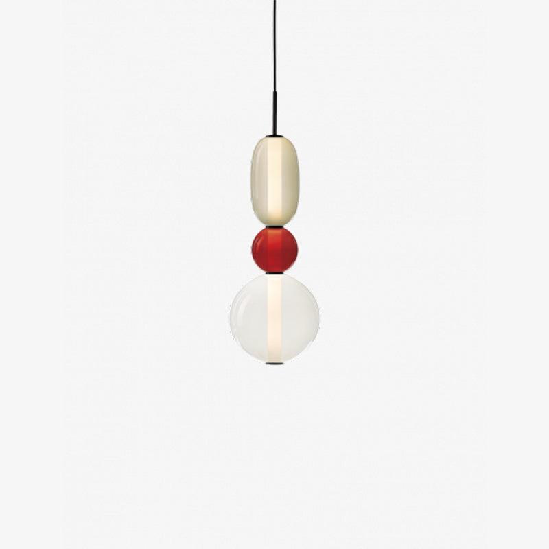 Luminaire design en verre, suspension LED pour salon, style épuré.