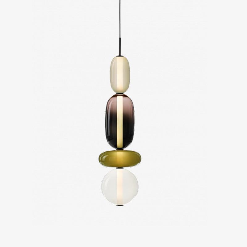 Luminaire design en verre, suspension LED pour salon contemporain.