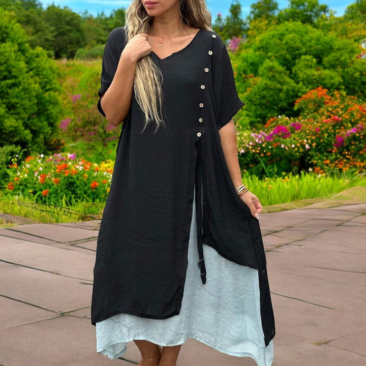 Robe d'été élégante col V pour femme, tissu léger et fluide, parfaite pour la mode estivale chic et confortable.