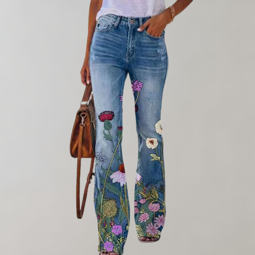 Jean femme taille haute évasé, imprimé floral tendance. Un pantalon chic pour un style printanier.