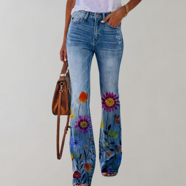 Jean femme évasé avec imprimé floral, taille haute élégante. Idéal pour un look tendance chic et décontracté.