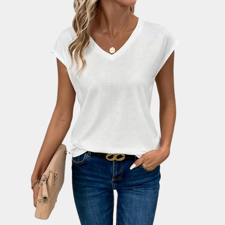Haut femme Nahla, col V chic et décontracté, parfait pour un confort aéré au quotidien. Style moderne.