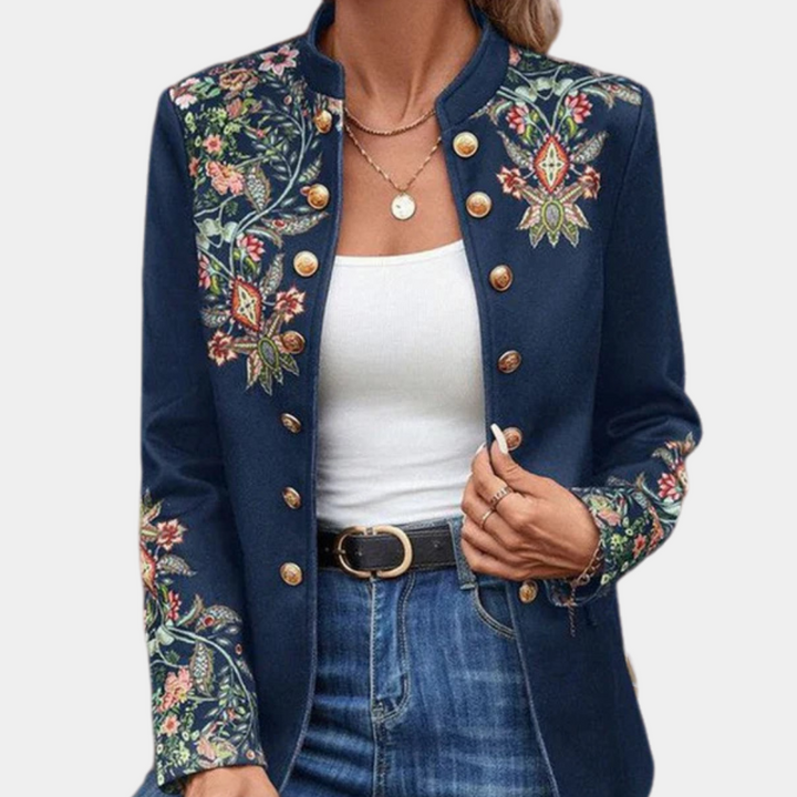 Blazer femme élégant brodé de fleurs, style vintage artistique, idéal pour une tenue de travail chic ou décontractée.