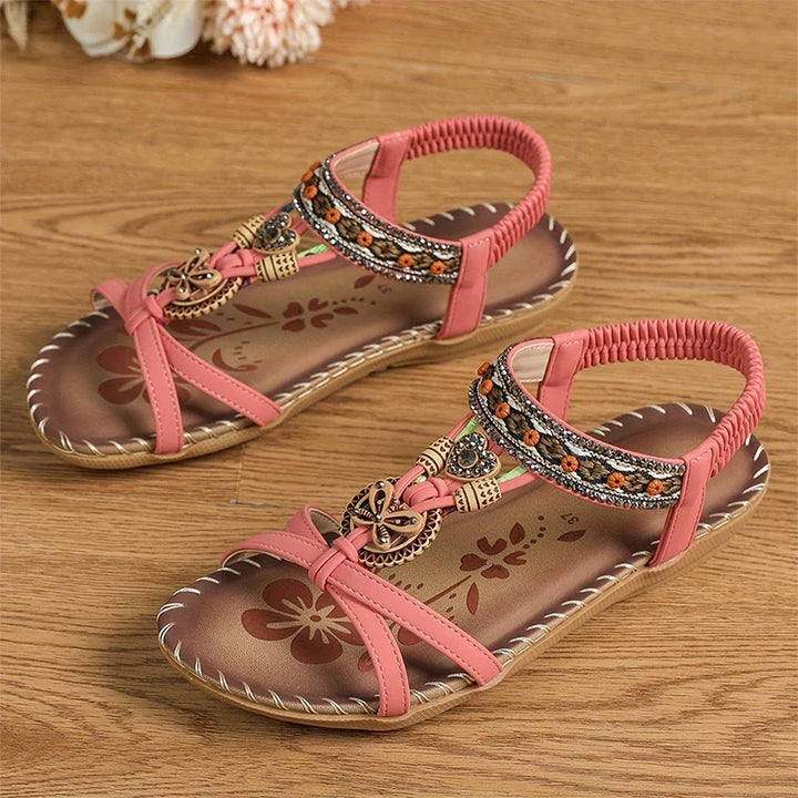 Sandales femme élégantes à strass et perles, pour un style casual chic ou soirée d'été. Chaussures plates confortables.