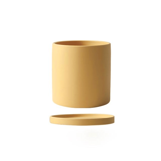 Pot de fleurs design moderne avec soucoupe, apporte une touche d'élégance à votre intérieur et vos plantes.