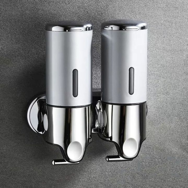 Distributeur mural en acier inoxydable pour shampoing, idéal pour douche moderne.