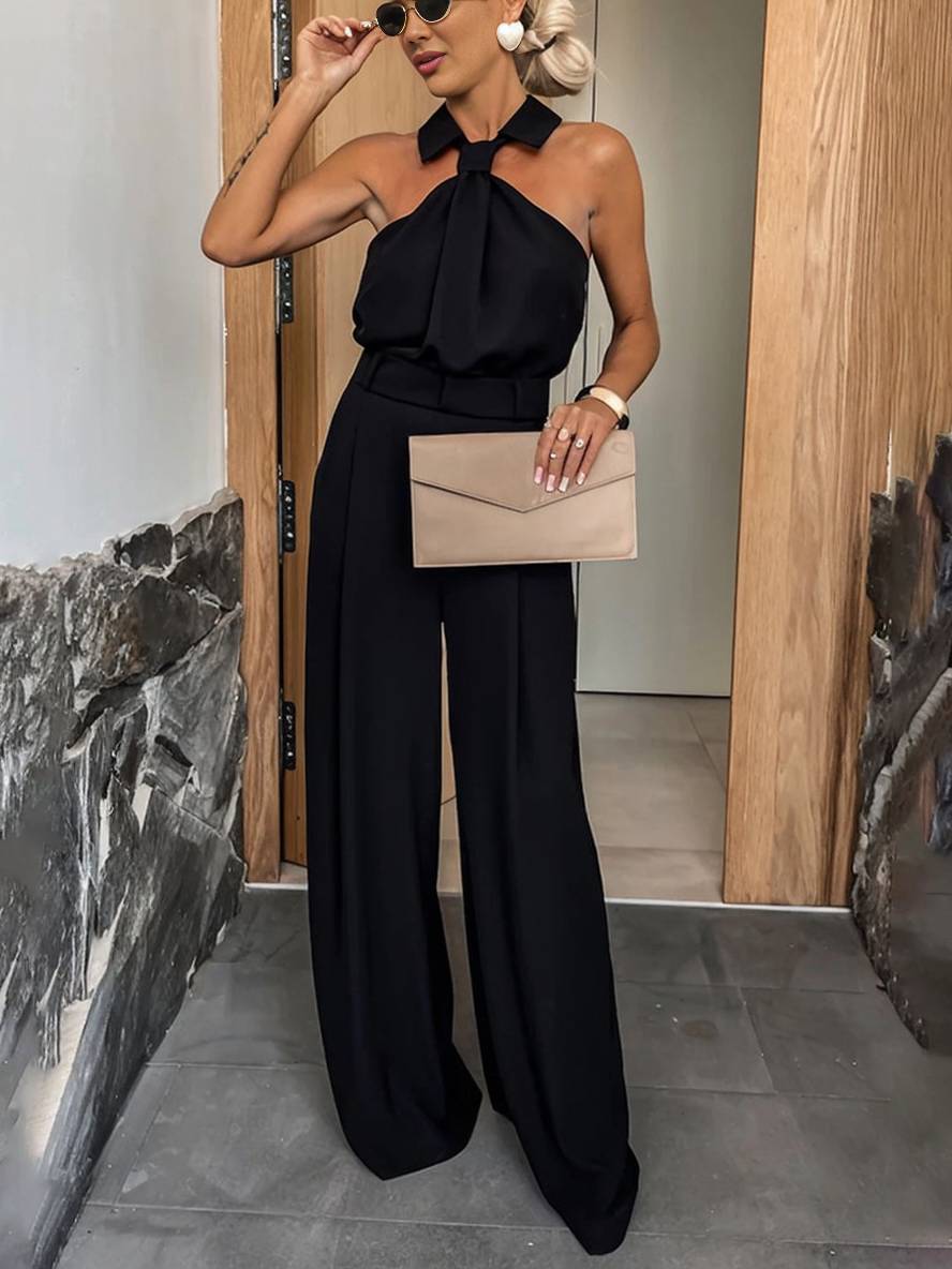 Silhouette fluide et chic: combinaison ample femme, col chemise sans manches. Idéale mode féminine d'été.