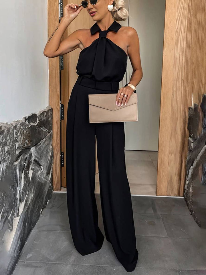 Silhouette fluide et chic: combinaison ample femme, col chemise sans manches. Idéale mode féminine d'été.