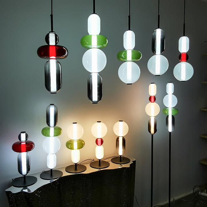 Éclairage design LED en verre, suspension pour salle à manger moderne.