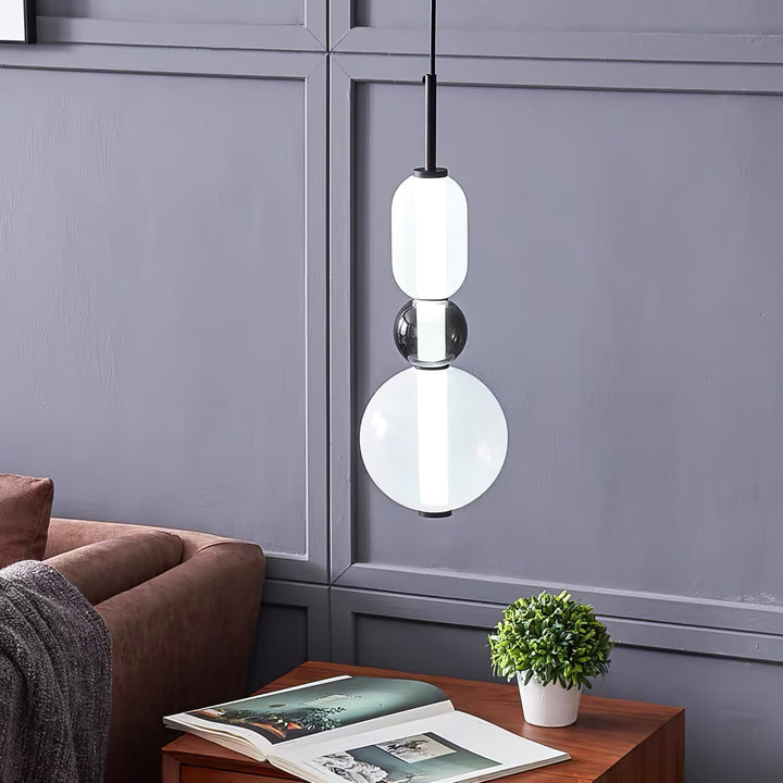 Luminaire en verre LED, design moderne pour salon et salle à manger.