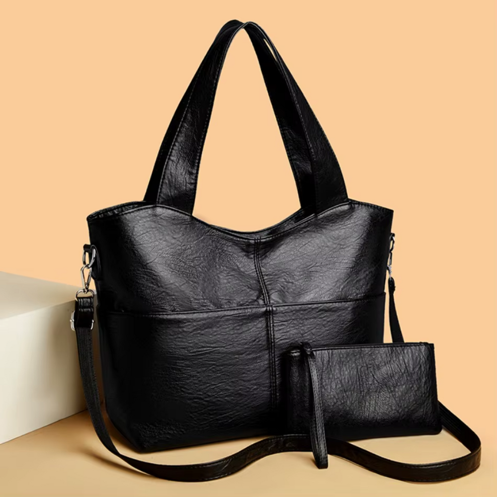 Sac à main femme chic noir, design structuré en similicuir. Bandoulière amovible, idéal pour l'organisation et style.