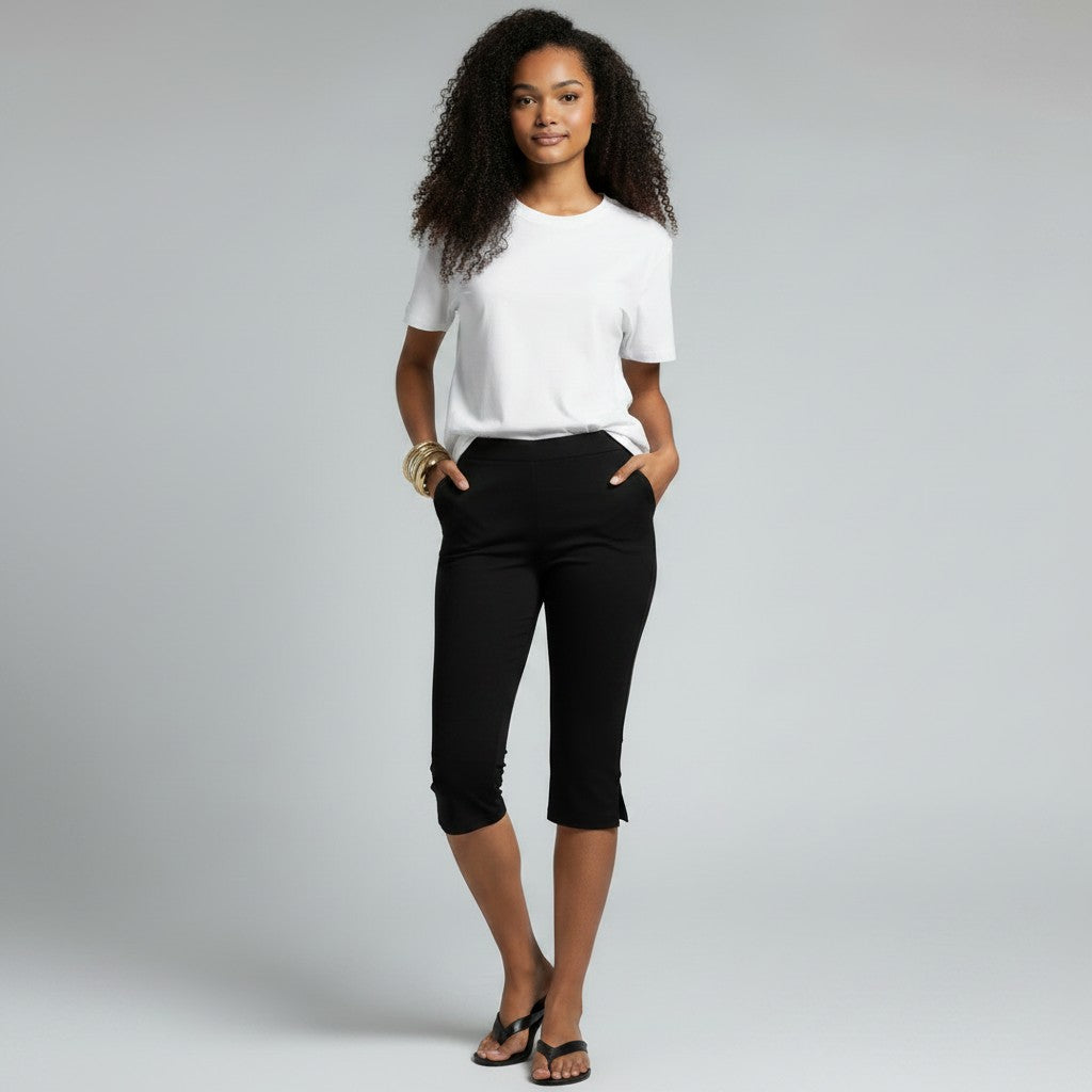 Pantacourt noir femme élégant et confortable, idéal pour le printemps, l'été ou le voyage. Style capri.