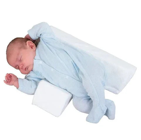 Coussin de sommeil bébé anti-roulade Cudlo, réglable et sécurisant pour nouveau-nés. Confort mousse mémoire.