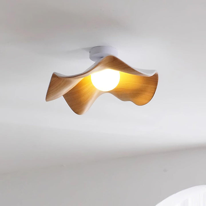 Luminaire de plafond organique, technologie LED, pour une ambiance apaisante.