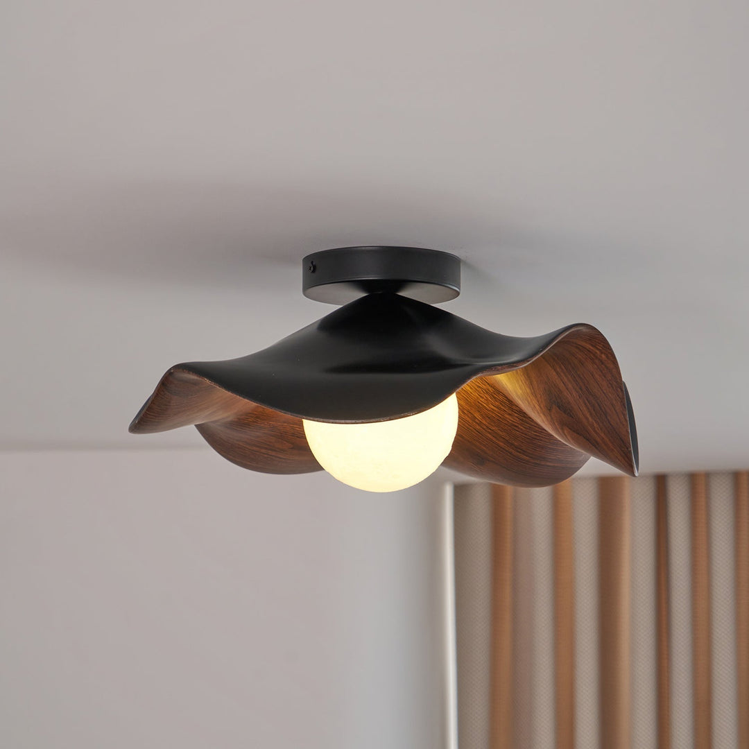 Plafonnier LED moderne organique, éclairage ambiant, élégance intemporelle.