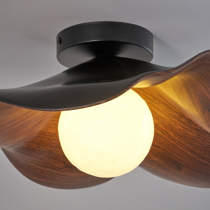 Éclairage organique LED pour plafond, élégance minimaliste pour intérieur moderne.