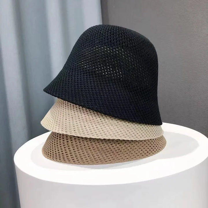 Chapeau de soleil femme, pliable et compact. Protection UV, parfait pour la valise d'été.