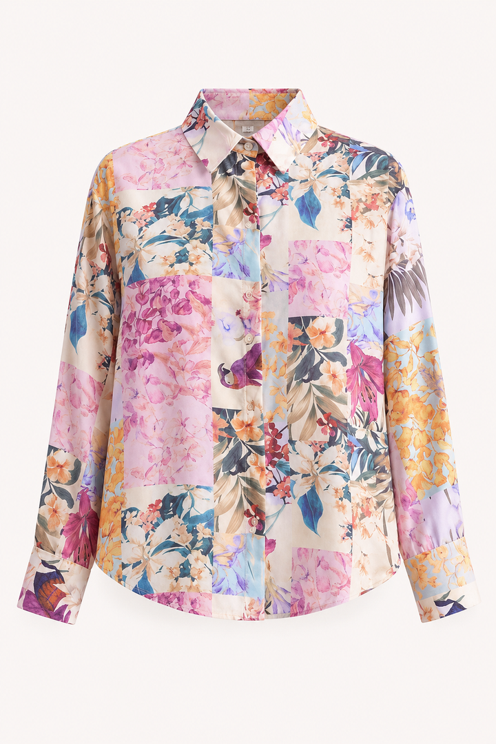Chemisier floral blanc et manches longues pour femme. Design printanier élégant et polyvalent.