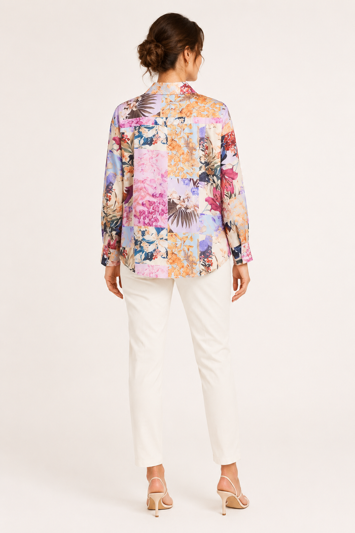 Blouse décontractée femme avec imprimé floral coloré, manches longues. Idéal mode printemps/été.