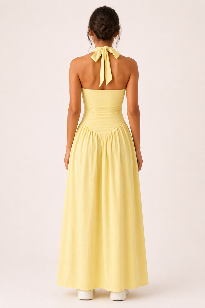 Robe longue jaune confortable et fluide pour femme, style décontracté chic, parfaite pour l'été et les loisirs.