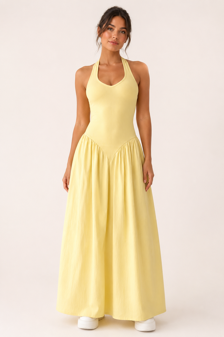Robe longue d'été jaune fluide et chic pour femme, dos nu élégant, idéale pour les vacances et la plage.