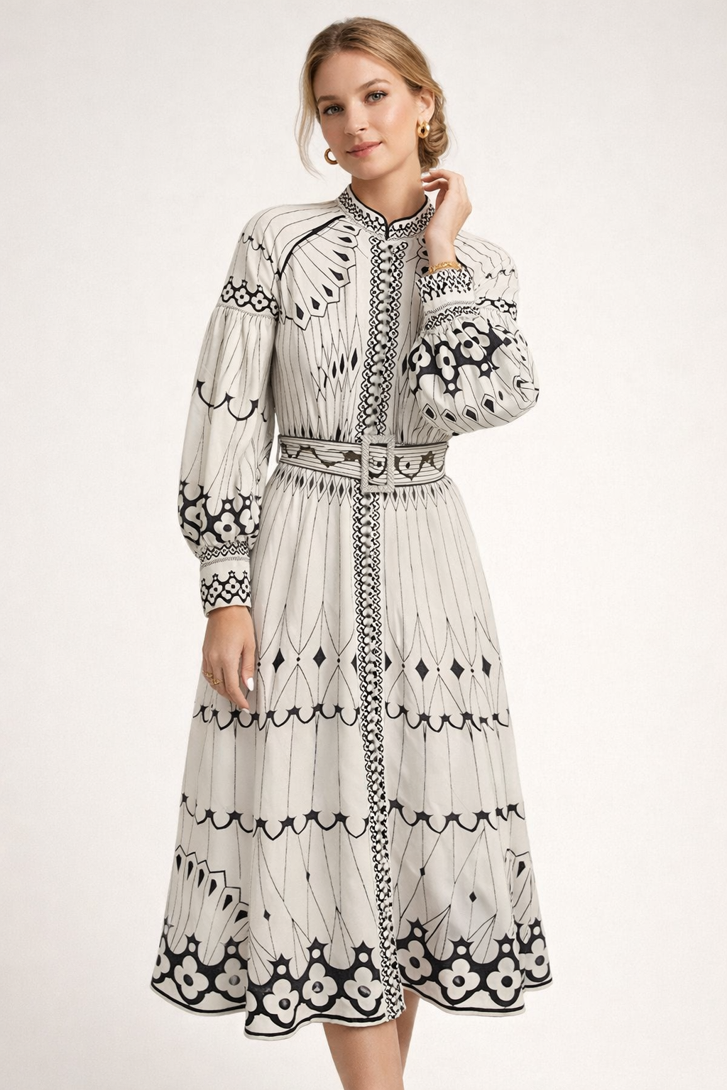 Robe midi femme fleurie élégante, manches lanternes, idéale printemps-été. Imprimé floral chic et frais.