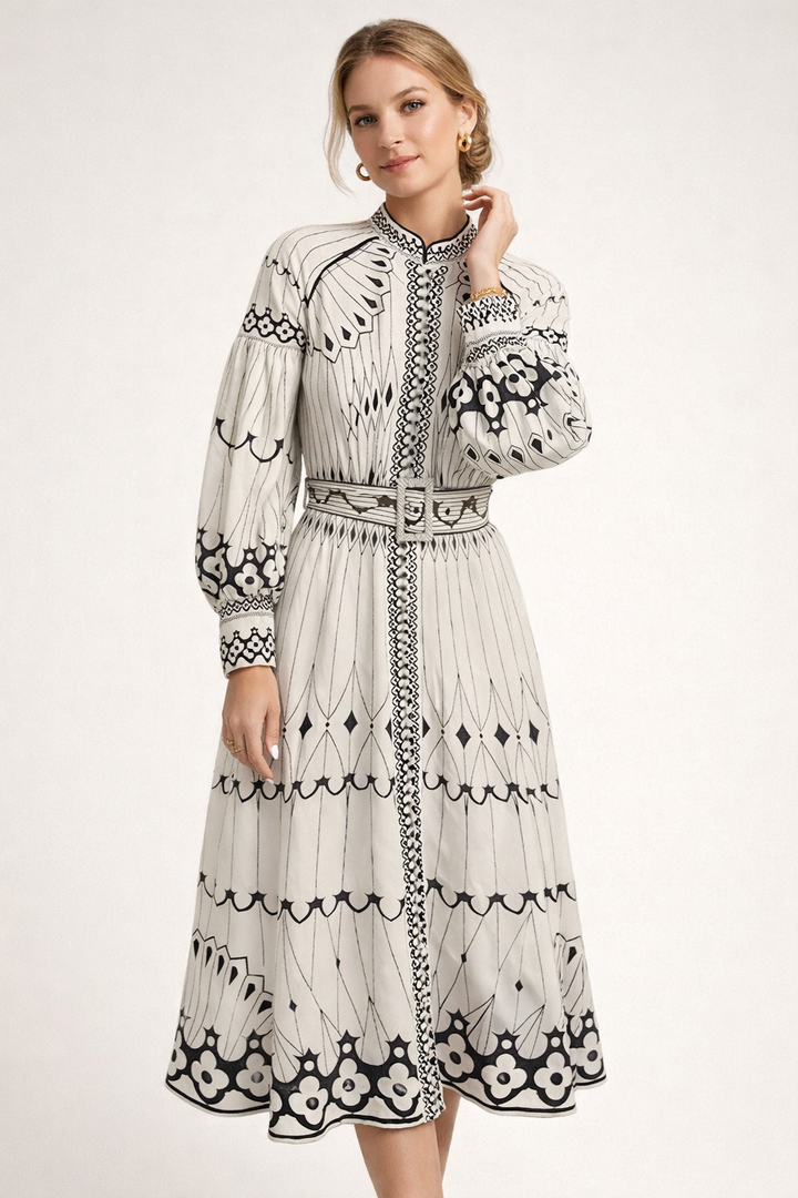 Robe midi femme fleurie élégante, manches lanternes, idéale printemps-été. Imprimé floral chic et frais.