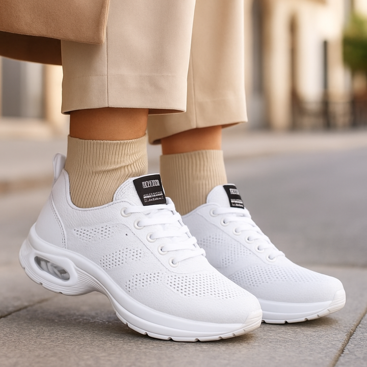 Baskets femme ultra-légères et flexibles, conçues pour le confort optimal et la réduction de la douleur aux pieds.