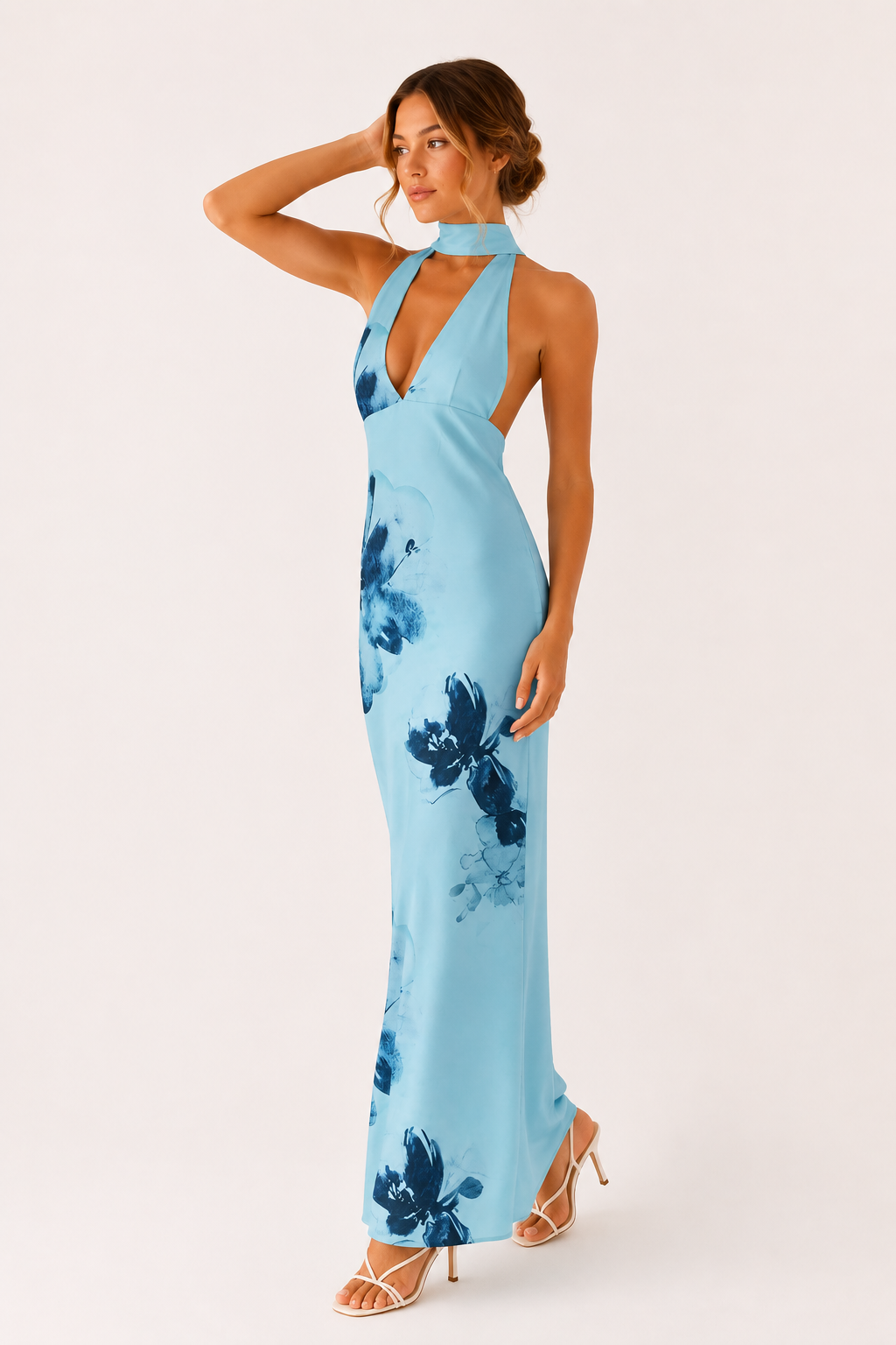 Sublime robe longue femme dos nu avec décolleté plongeant, élégance intemporelle pour occasions spéciales.