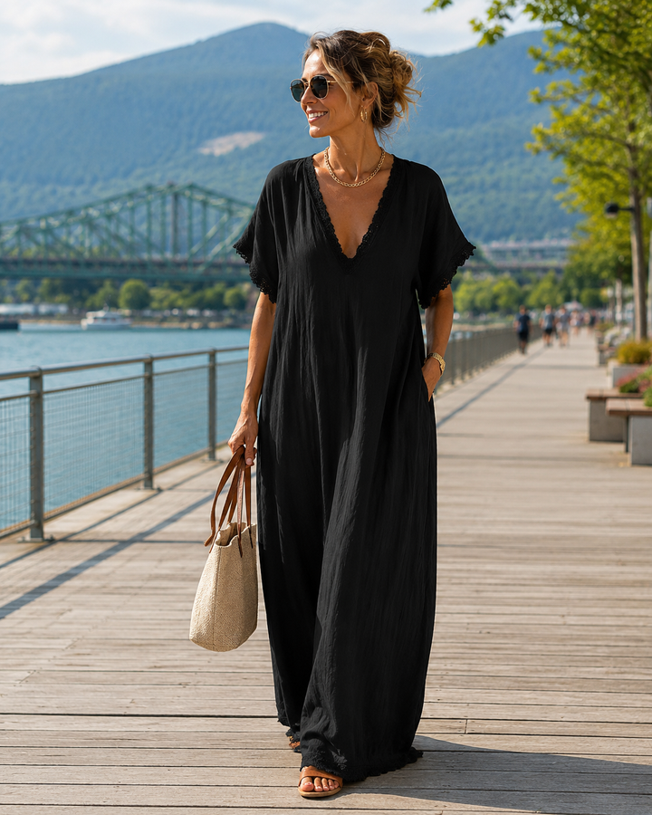Robe fluide ample femme, coupe longue élégante, col V et dentelle. Idéale pour un look fashion d'été.