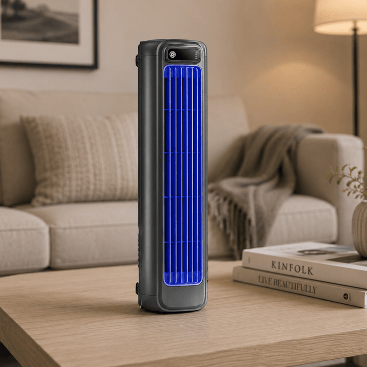 Ventilateur de bureau USB sans fil compact gris, idéal pour le rafraîchissement personnel au travail ou à la maison.