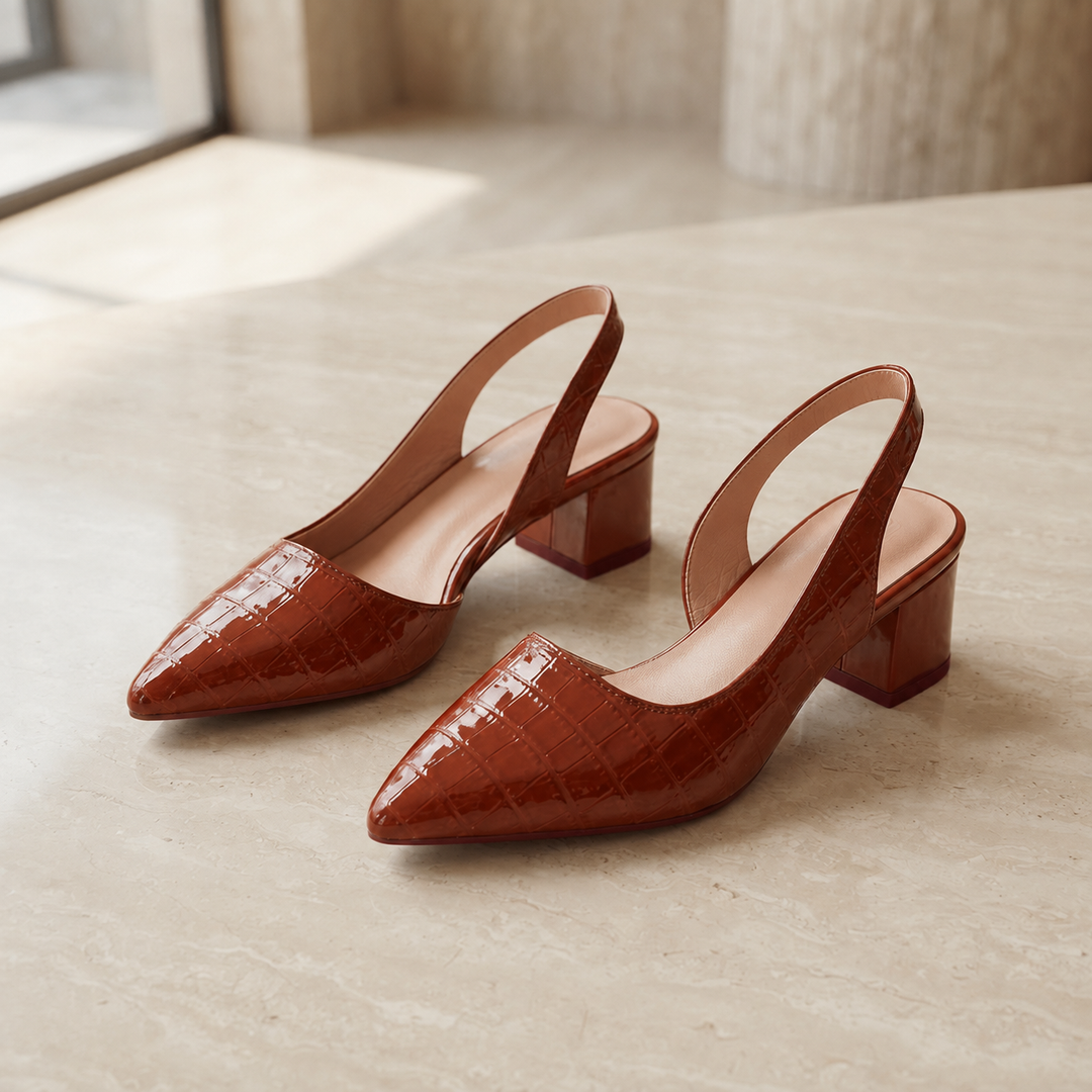 Paire de talons orthopédiques pour femmes, idéals pour le travail, offrant un soutien optimal de la voûte.
