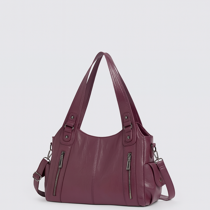 Sac à main fourre-tout moderne en cuir vegan pour femme, alliant élégance et fonctionnalité.