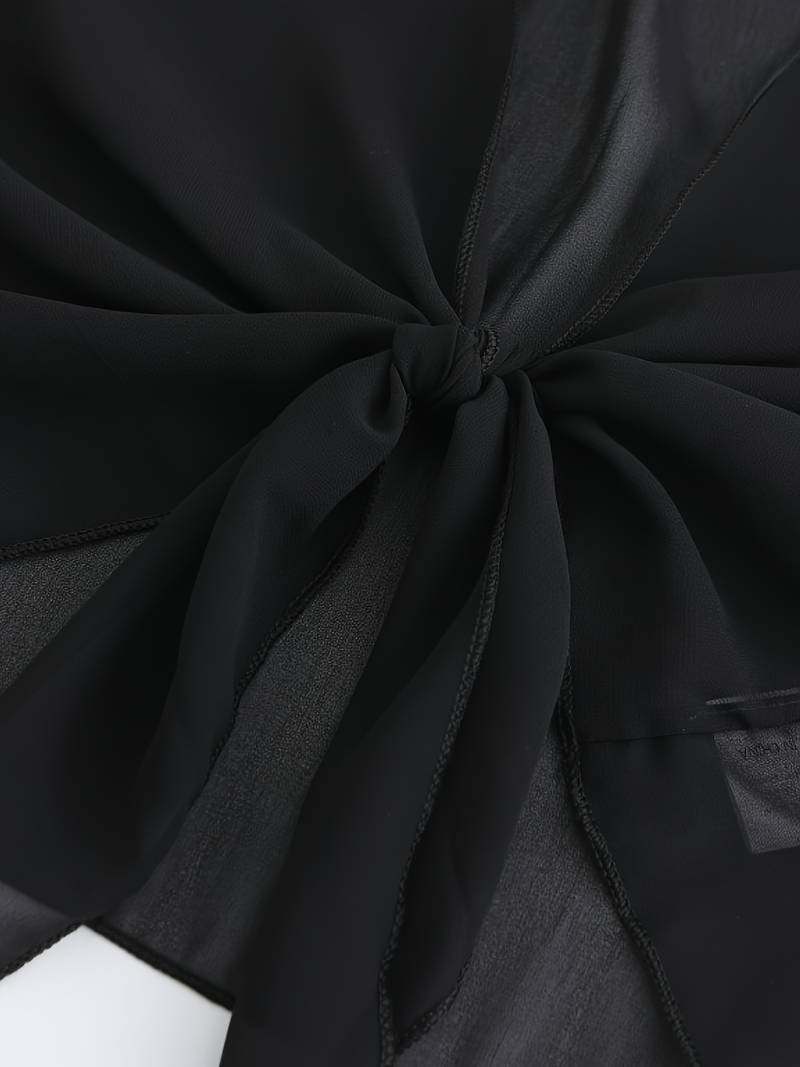 Chemisier femme polyvalent, chemise légère à devant ouvert. Confortable et élégant pour le quotidien.