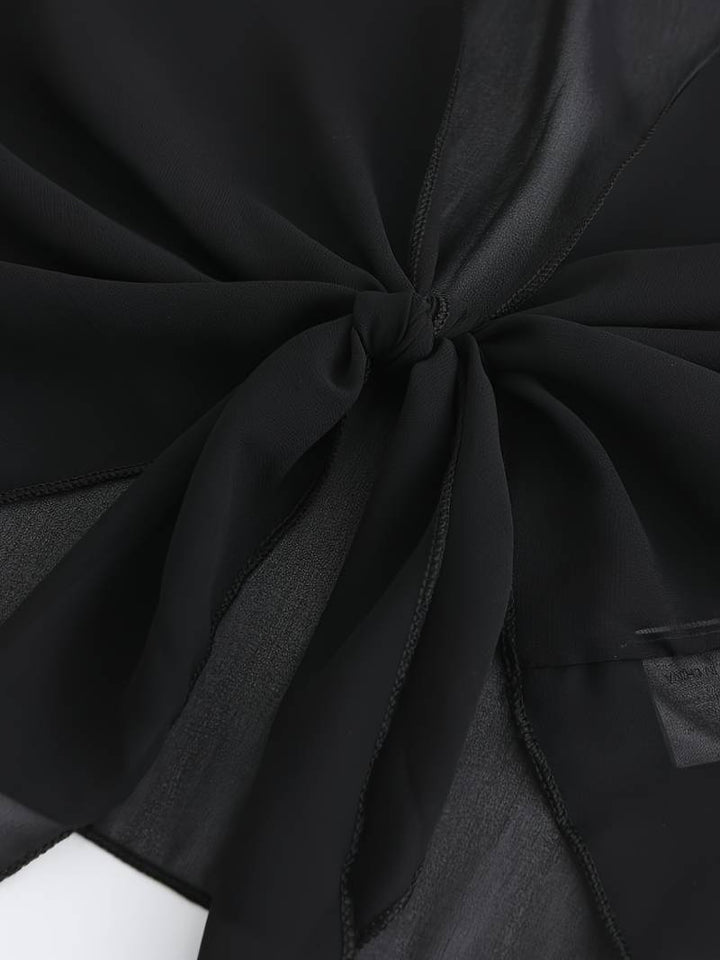 Chemisier femme polyvalent, chemise légère à devant ouvert. Confortable et élégant pour le quotidien.