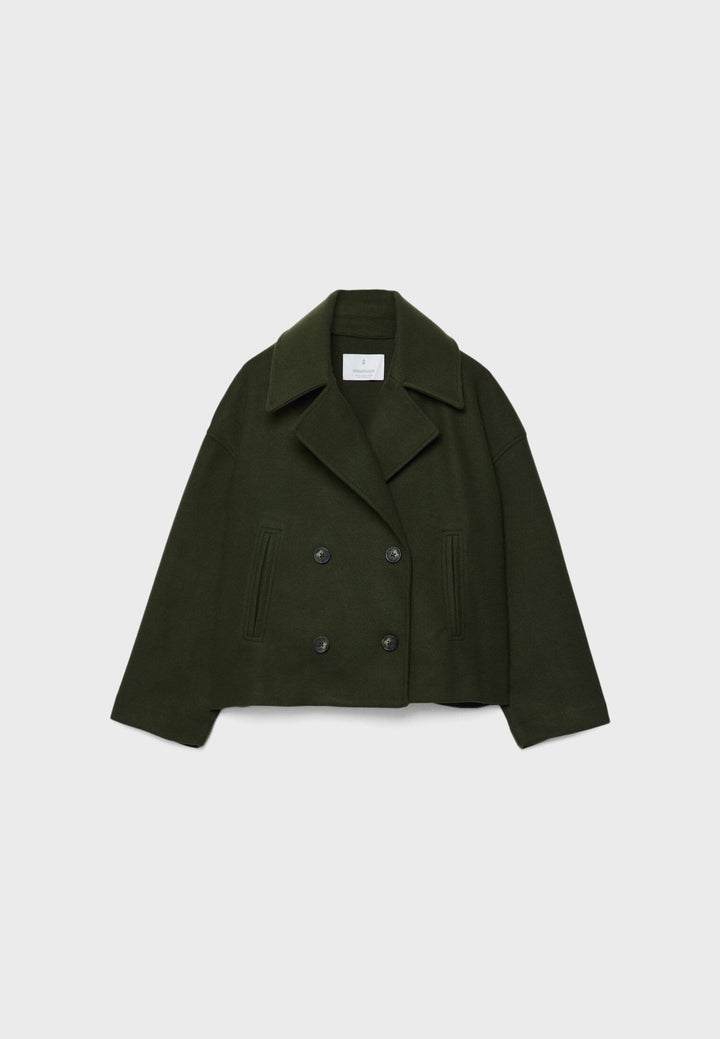 Veste tailleur femme, double boutonnage, élégante et moderne, parfaite pour les saisons froides.