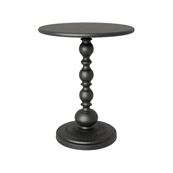Utilisation de la table d'appoint ronde balustre comme support pour plante ou objet décoratif.