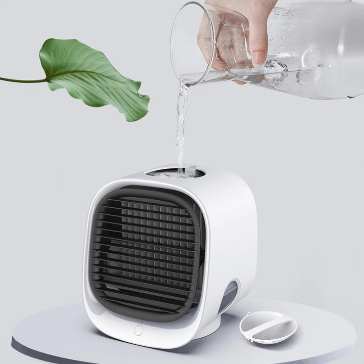 Ventilateur puissant du climatiseur portable USB compact, diffusant un air frais instantané pour soulager la chaleur.