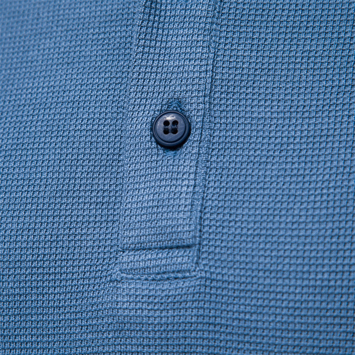 T-shirt Henley homme à manches longues, parfait pour toutes saisons. Confortable, boutons et style casual essentiel.